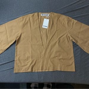 tan toit volant low v-neck top